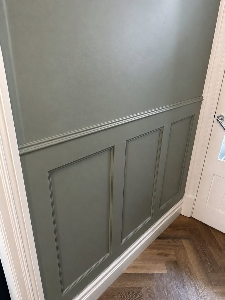 Hallway panelling shaped around every angle